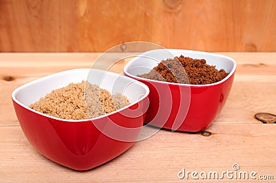 Two samples of brown and dark brown sugar Stock Photo