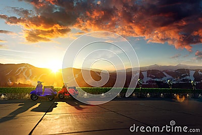 Two scooter with mountain scenery in the background Stock Photo