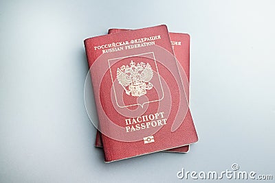 Two scratched russian pasports on grey background Stock Photo