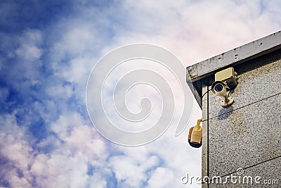 Two Security cameras on the side of an modern building Stock Photo