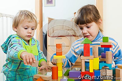 Two serious children in home Stock Photo