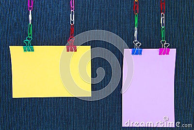 Two sheets of paper on dark-blue background Stock Photo
