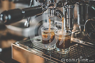 Coffee being made in Espresso Machine Stock Photo