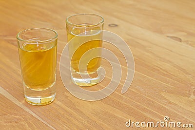 Two shots of homemade herbal liquor Stock Photo