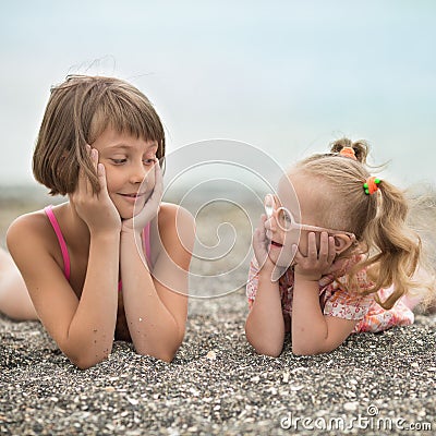 Two sisters looking at each other with love Stock Photo