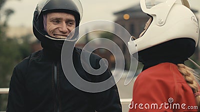 Two skydivers in protective helmets are talking. Skydivers preparing to fly Stock Photo