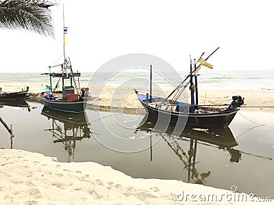 Two small fishing boats wait out for fishing. Stock Photo