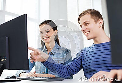 Two smiling students having discussion Stock Photo