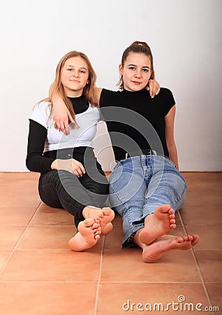 Two teenage girls smiling friends Stock Photo