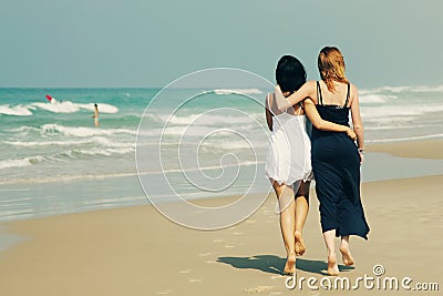 Two smiling young teenage girlfriends Stock Photo