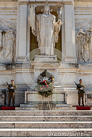 Two soldiers guarding the Unknown Soldiers tomb at the Vittorio Emanuele II Monument in Rome. Editorial Stock Photo