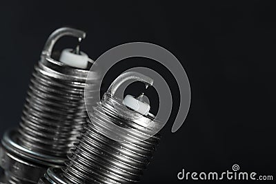 Two spark plugs on black background Stock Photo