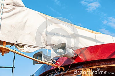 Two speaking trumpets on the ship. Horn speaker on the background of a boat and blue sea water. a white megaphone on the Stock Photo