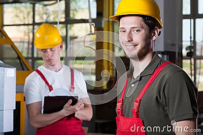 Two specialists working at factory Stock Photo