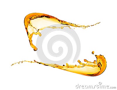 Two splashes of clear yellow liquid isolated on white background. File contains a path to isolation. Stock Photo