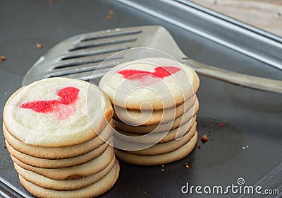 Two stacks of home baked cookies on cookie sheet Stock Photo