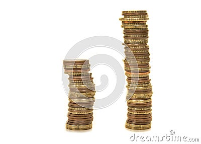 Two stacks of used coins representing double sales or income iso Stock Photo