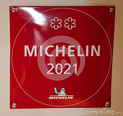 Two Star Michelin Guide plaque at the Two Star Michelin Aquavit restaurant in Midtown Manhattan Editorial Stock Photo