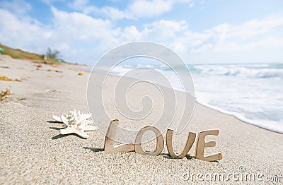 Two starfish with love message on Florida beach Stock Photo