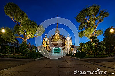 Two statue giant at churches Wat Arun, Bankok Thailand Stock Photo