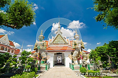 Two statue giant at churches Wat Arun, Bankok Thailand Stock Photo