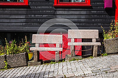 Two stone benches on the street in Bergen Stock Photo