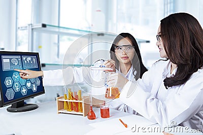 Two students doing chemical research Stock Photo