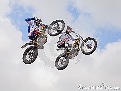 Jumping with a motorcycle trial Editorial Stock Photo