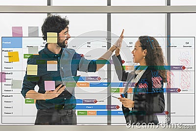 Businessperson brainstorming together for project schdule with gantt chart Stock Photo