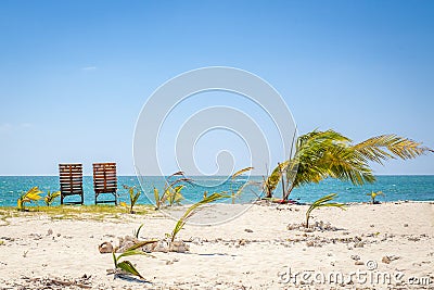Two sunbeds on the smal Island with lovely sand Stock Photo
