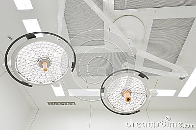 Two surgical lamps in operation room Stock Photo