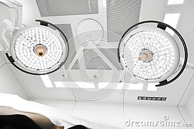 Two surgical lamps in operation room Stock Photo