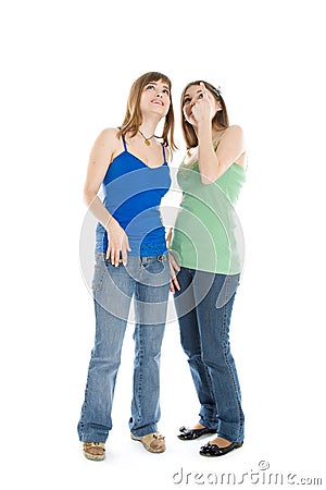 Two teenage girls looking up Stock Photo