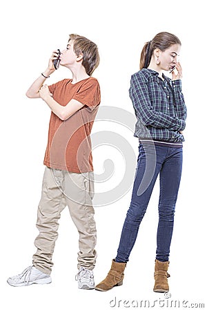Two teenager kissing their smart phones Stock Photo