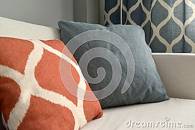 Two throw pillows lie on a sofa. Living room interior fragment Stock Photo