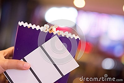 Two tickets and popcorn for going to the movies Stock Photo