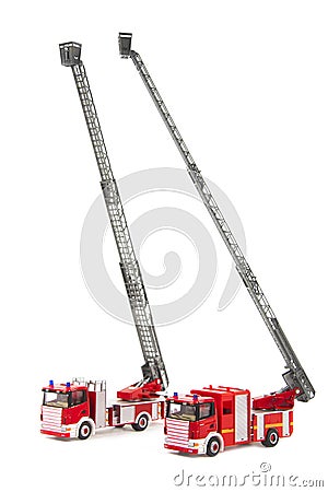 Two toy firetrucks wit ladders Stock Photo