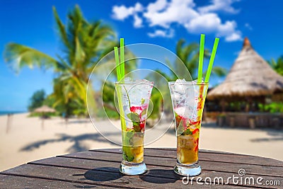 Two tropical cocktails at the exotic beach Stock Photo