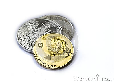 Two Troy Ounces of fine silver - .999 - coins and .800 gold coin Stock Photo