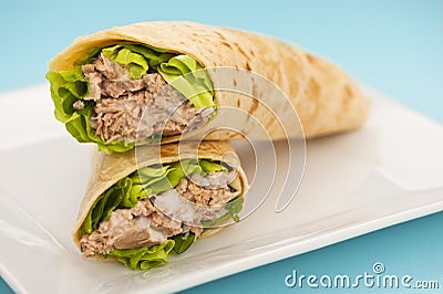 Two tuna melt wrap on a white plate Stock Photo