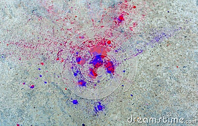 Two types of dry Holi colors splash on gray background Stock Photo