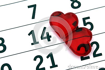 Two valentines lie near the number 14. Valentine`s day. Stock Photo