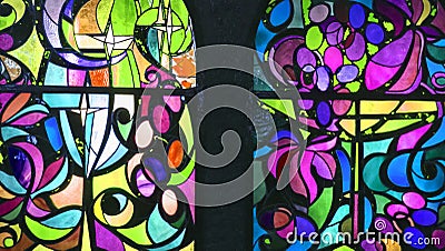 Two vertical stained glass windows with abstract background of multicolored glass with floral and fruit ornaments Stock Photo