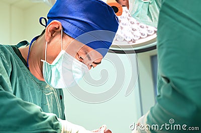 Two veterinarian doctor working in operating room Editorial Stock Photo