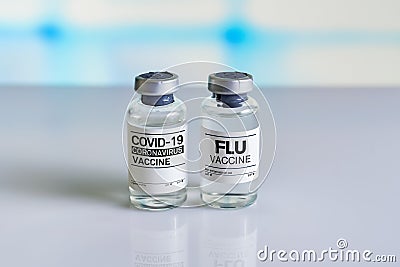 Two vials for Vaccinating against covid-19 and flu at same time Stock Photo