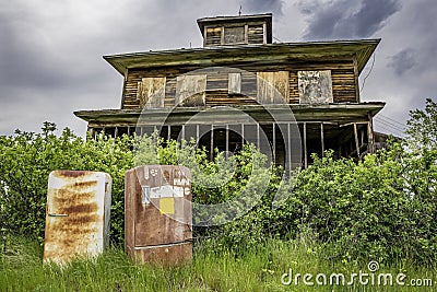 Two vintage fridges abandoned outside an old home on the prairies Stock Photo