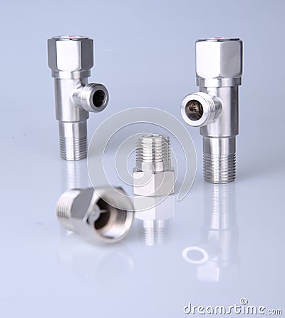 Two water valves made of stainless steel Stock Photo