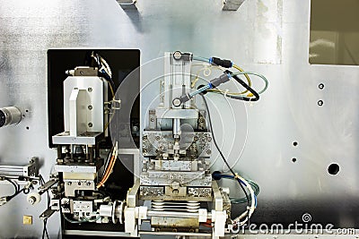 Two way Pneumatic cylinder setup on machine for electronic industry. Stock Photo