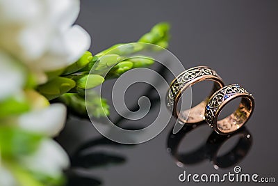 Two wedding rings in infinity sign. Love concept Stock Photo