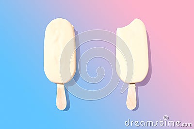 Two white chocolate icecreams on stick Stock Photo